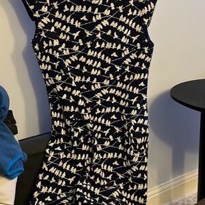 Boutique item. Never worn. beautiful, fully lined mini dress